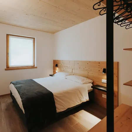 Апартаменты Falcade Lodge *